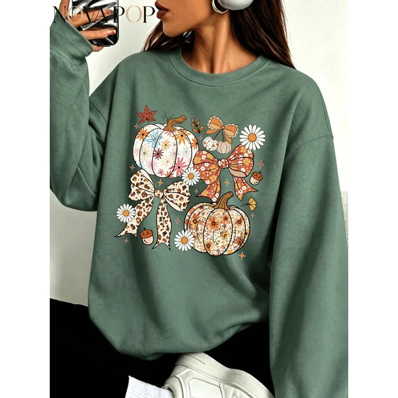 Women’s plus-size fleece-lined crewneck sweatshirt, featuring autumn-themed motifs such as bows, pumpkins, and pinecones