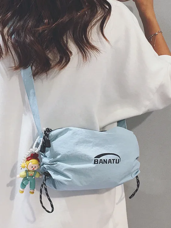 simple-canvas-bag-hong-kong-summer-trend-ladies-2026-new-style-travel-sports-cycling-crossbody-dumpling-bag-casual-leisure