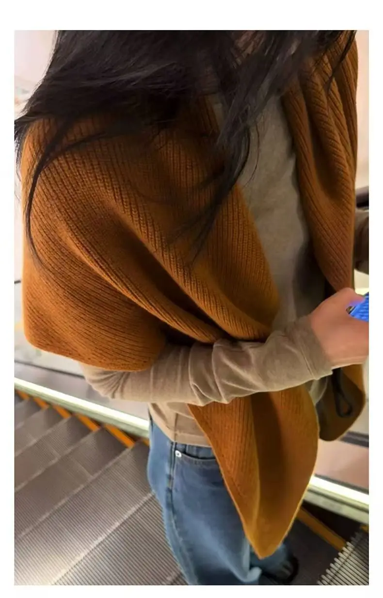 Grey knit triangle cashmere scarf atmosphere neck warm shawl draped outside.