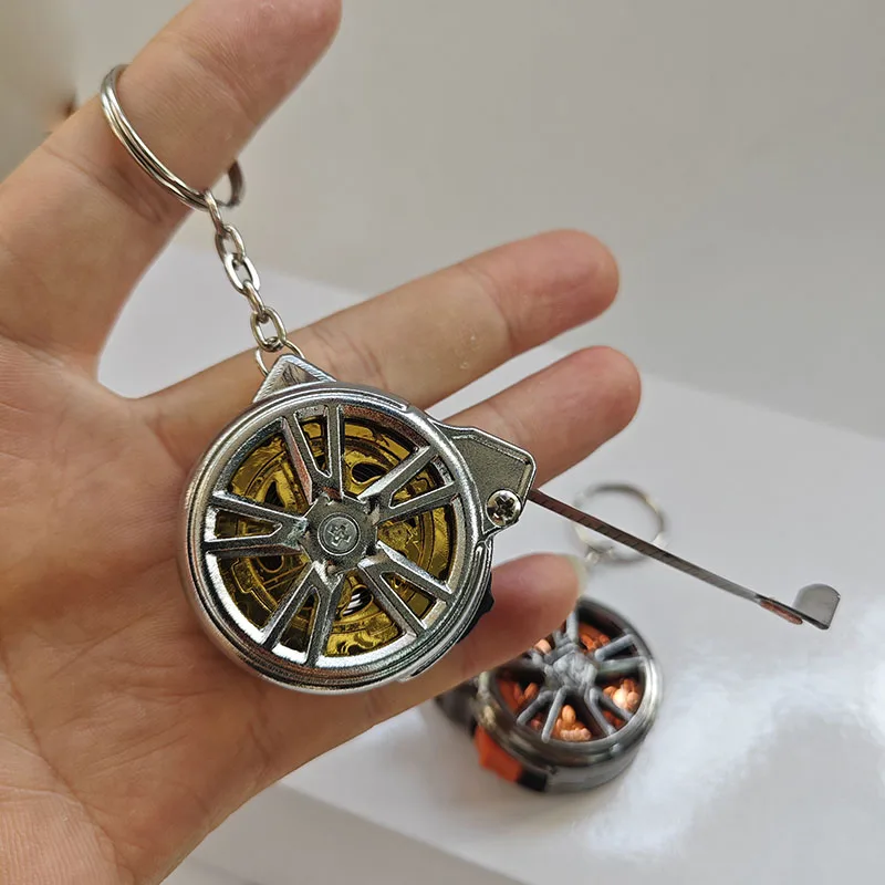 

2M Retractable Steel Tape Measure Keychain - Stylish Tire Design, Clicking Fidget Toy, Waterproof Dual Scale Tool