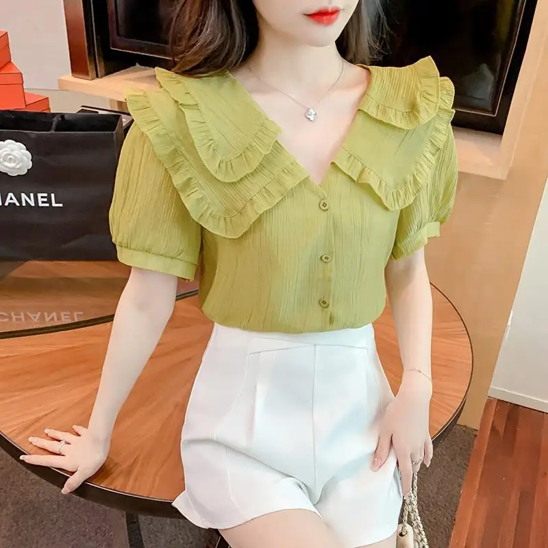 Blouse female 2023 new design sense of niche fungus doll collar short -sleeved top women high -level and unique beautiful shirt