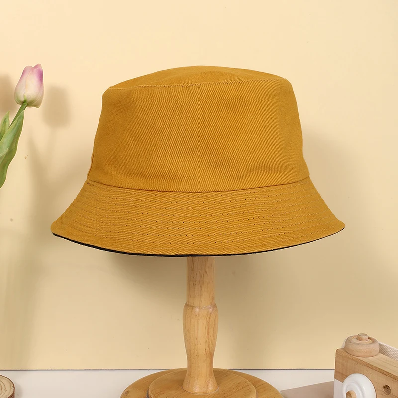 Spring and autumn candy color simple light plate solid color double-sided fisherman hat suitable for men and women daily leisure