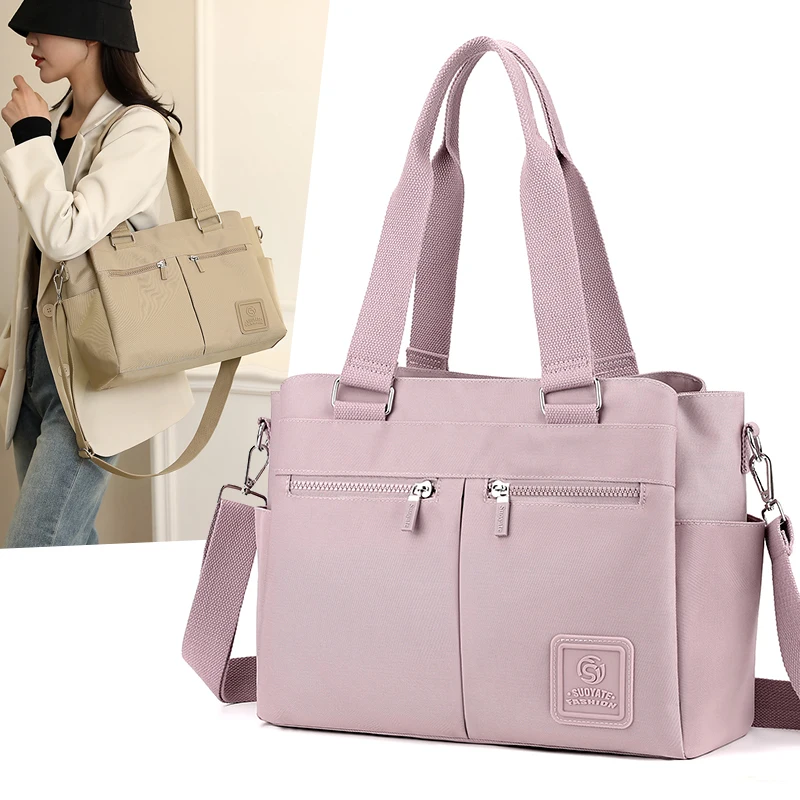 Borsa da viaggio da donna di moda borsa a tracolla femminile in tessuto durevole di grande capacità Multi tasca Design ragazze Casual Tote