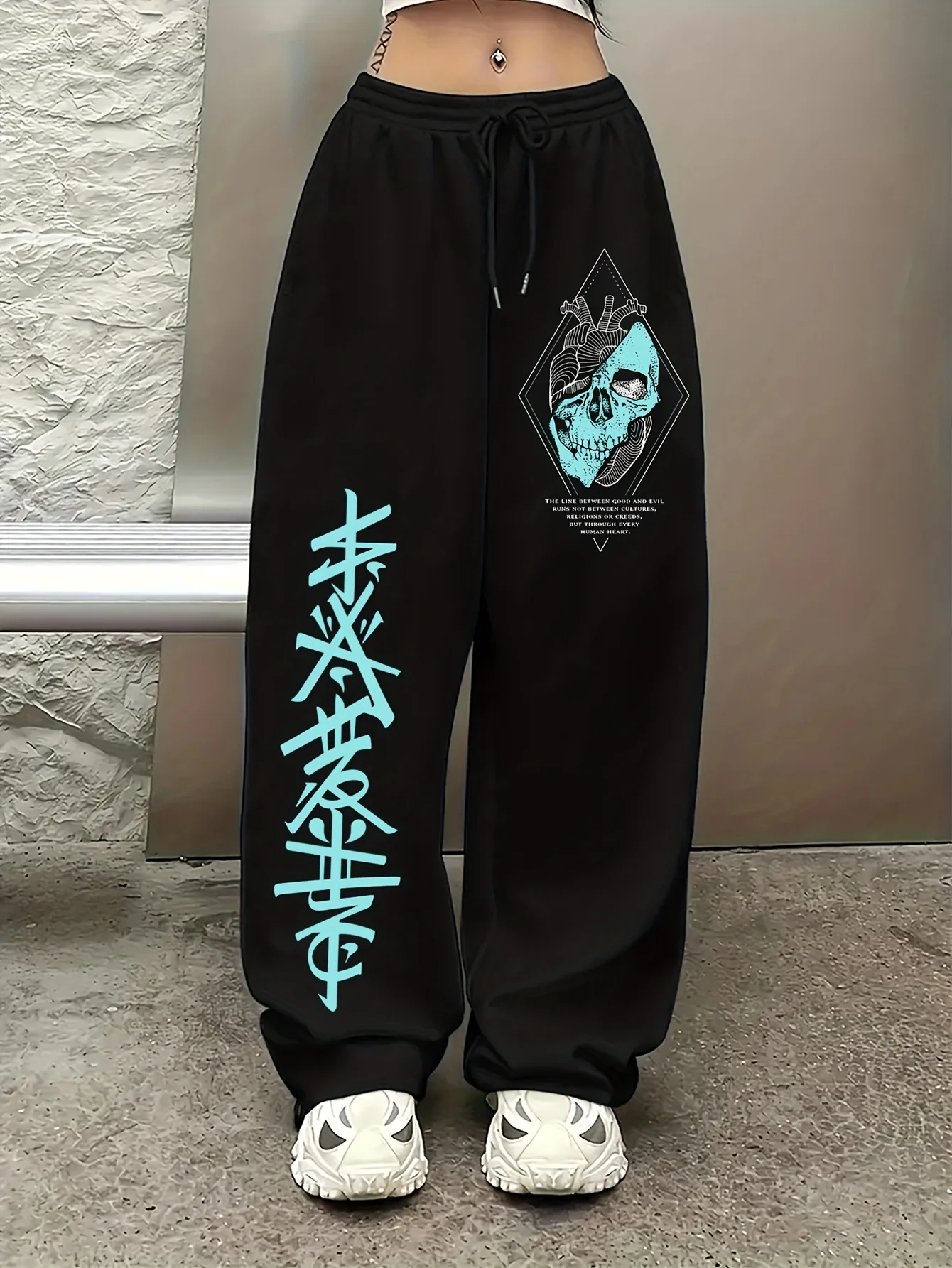 شخصية واسعة الساق السراويل الرياضية غير رسمية وفريدة من نوعها الجمجمة المطبوعة حبل مطاطا الفرقة المرأة السراويل الجري مستقيم.