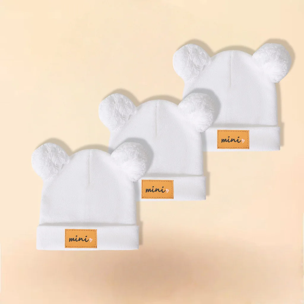 

Autumn and winter children's knitted hats, boys' and babies' woolen hats, cute hairballs, warm and cold-proof mini letters