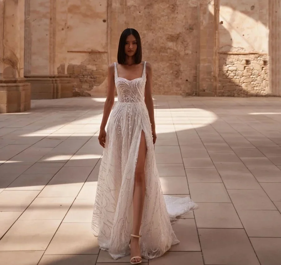 

Customized Modern Pearls Wedding Dresses Sequins Beaded Bridal Gowns Spaghetti Straps Bride Dresses Side Split Vestido de novias