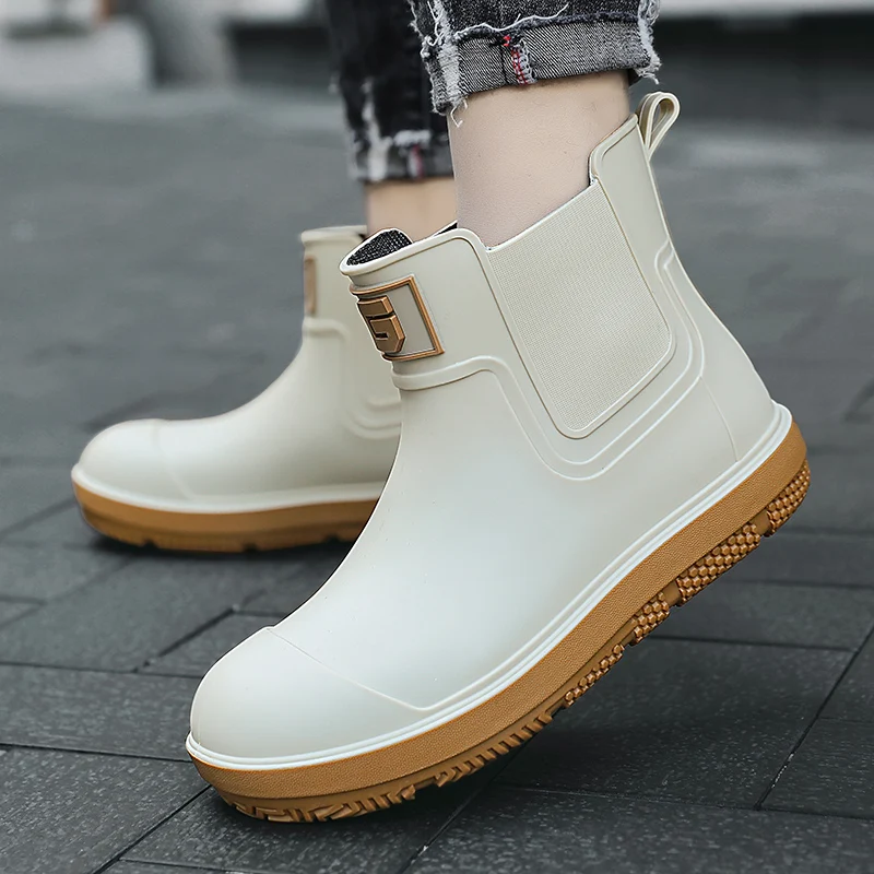 Stivali da pioggia antiscivolo da uomo a tubo corto Scarpe da acqua basse alla moda Stivali da pioggia modellati in un unico pezzo in PVC Scarpe impermeabili per lavori agricoli