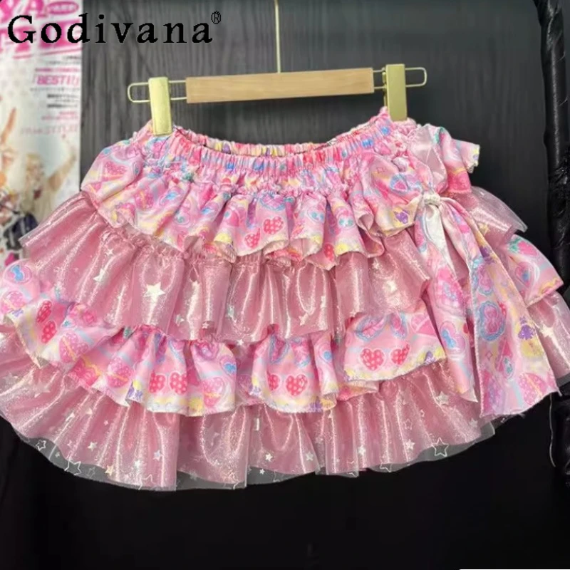 الحلو الأصلي لطيف الوردي تنورة المرأة المطبوعة Y2K القوس تصميم رقيق كعكة اللباس الإناث الصيف الشارع ارتداء الأميرة تنورة صغيرة