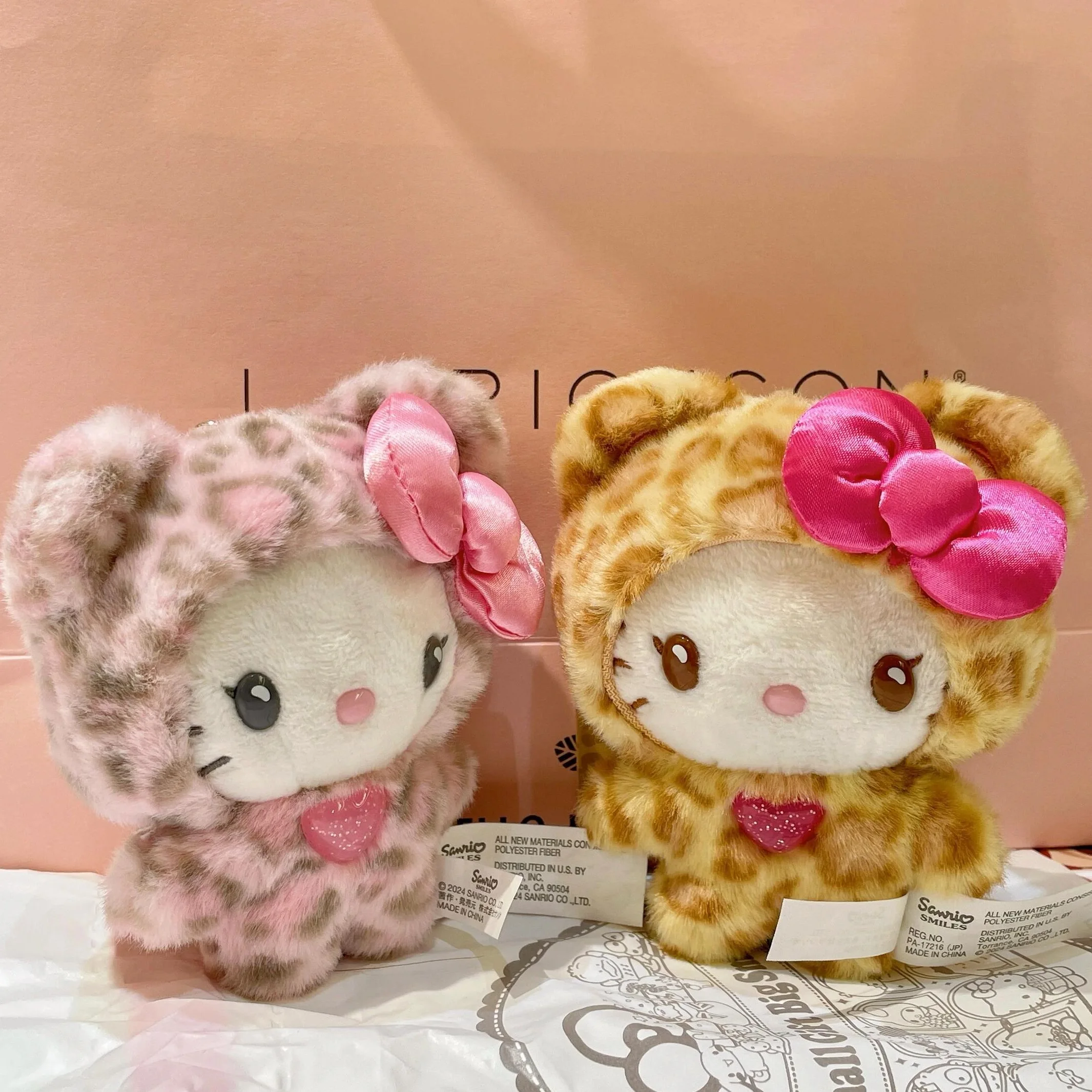 Sanrio Cream Plush Kitty Keychain with  Cheetah Print Outfit ??Guess who finally made it to our shop?! Hello Kitty and  main image 3