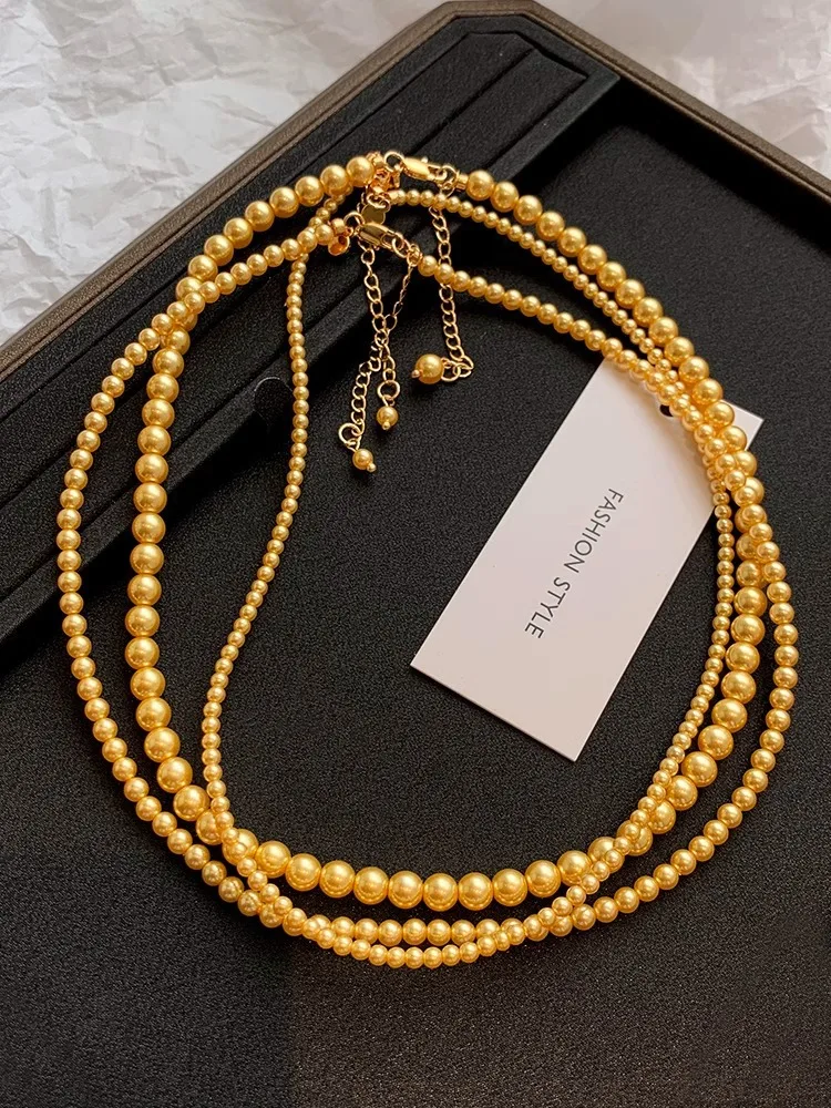 Champagne Gold Nini Extremely Fine 2mm Shijia Pearl Necklace Women's Light Luxury Premium Clavicle Chain Small Rice Necklace