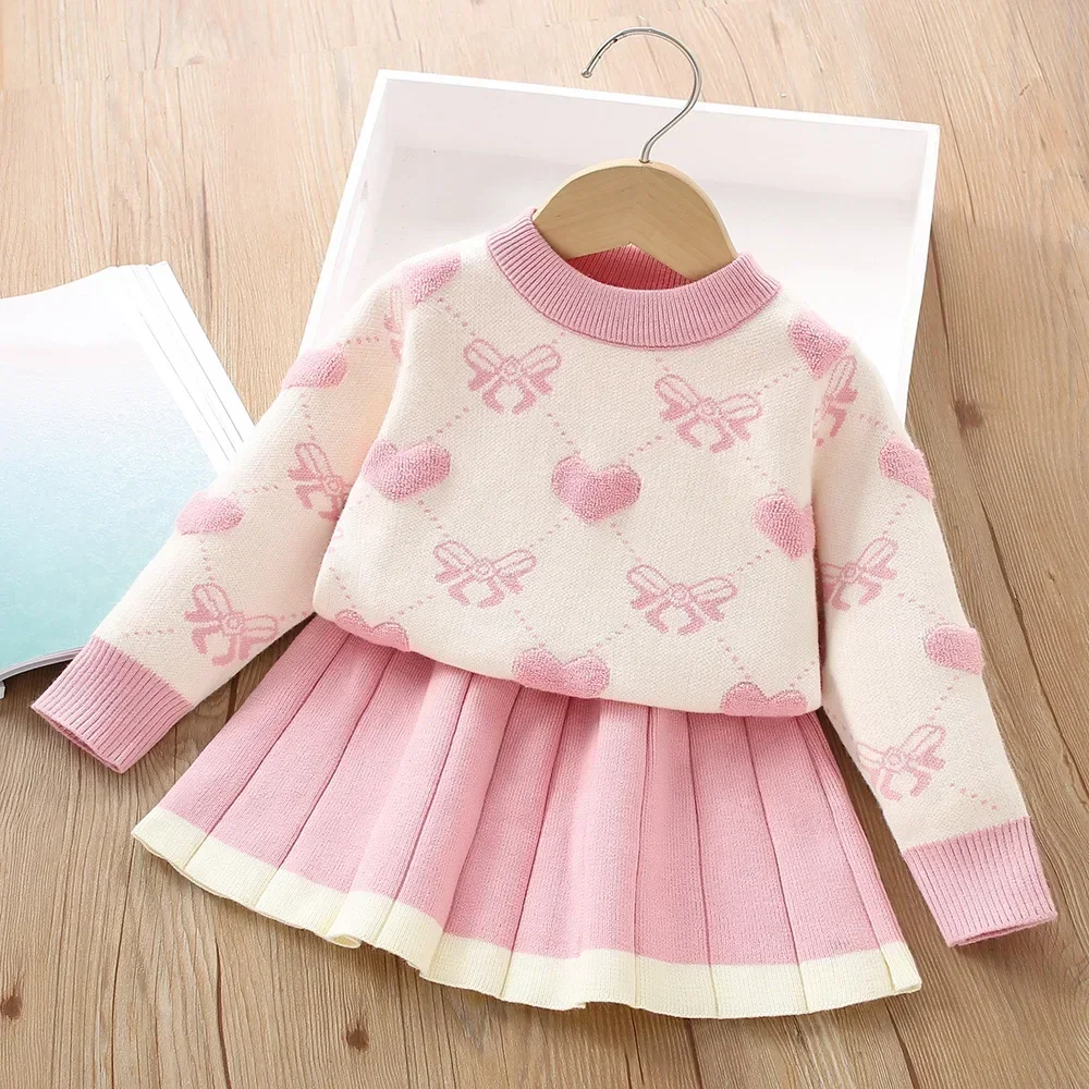 Zimowy zestaw ubrań dla dziewczynek w wieku 3-7 lat: różowy, słodki sweter z długim rękawem i spódniczka plisowana.