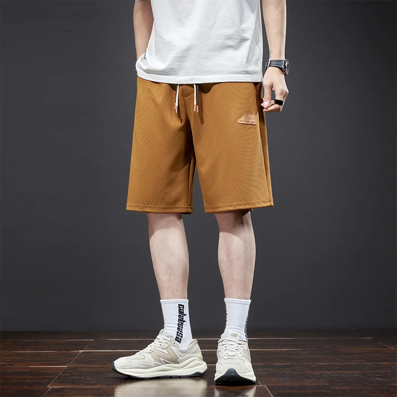 

2025 летние новые базовые повседневные шорты, мужские модные молодежные свободные и удобные брюки 100 четвертей