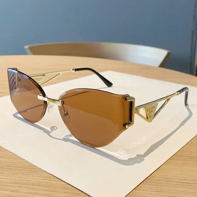 

Hollow Metal Frame High-end European and American Cat Glasses Sunshade and Sunscreen Sunglasses Frameless Sunglasses for Women