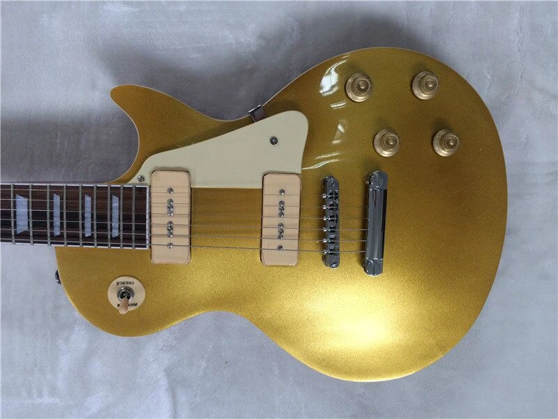 Manufacturer direct sales integrated LP electric guitar front gold retro string button, customizable