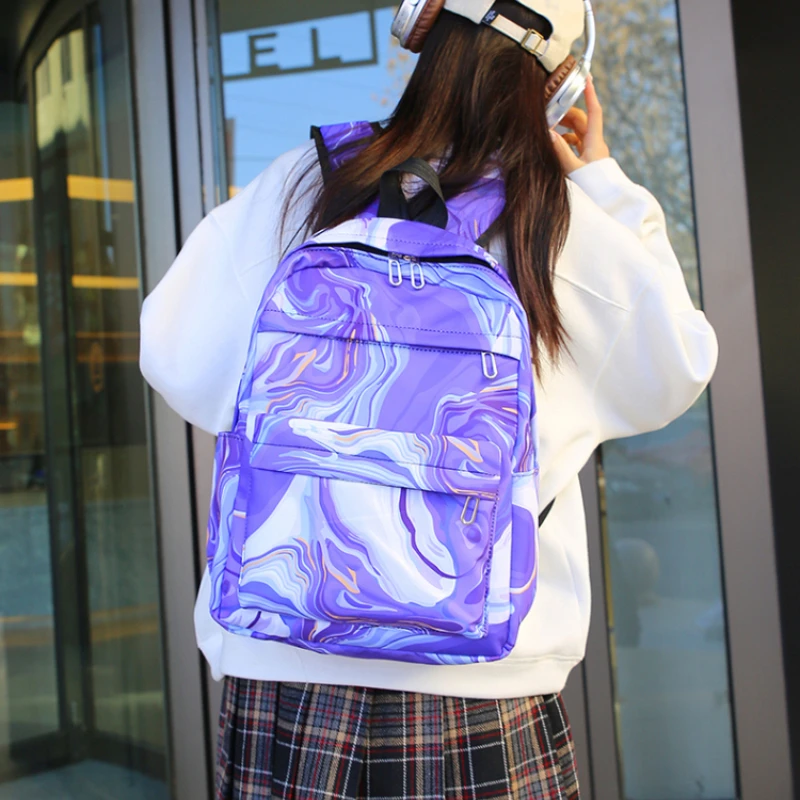 A New Student School Bag 2024 Hot Selling Nylon Material Fashion Pattern Backpack Lightweight Large Capacity Commuter Backpack