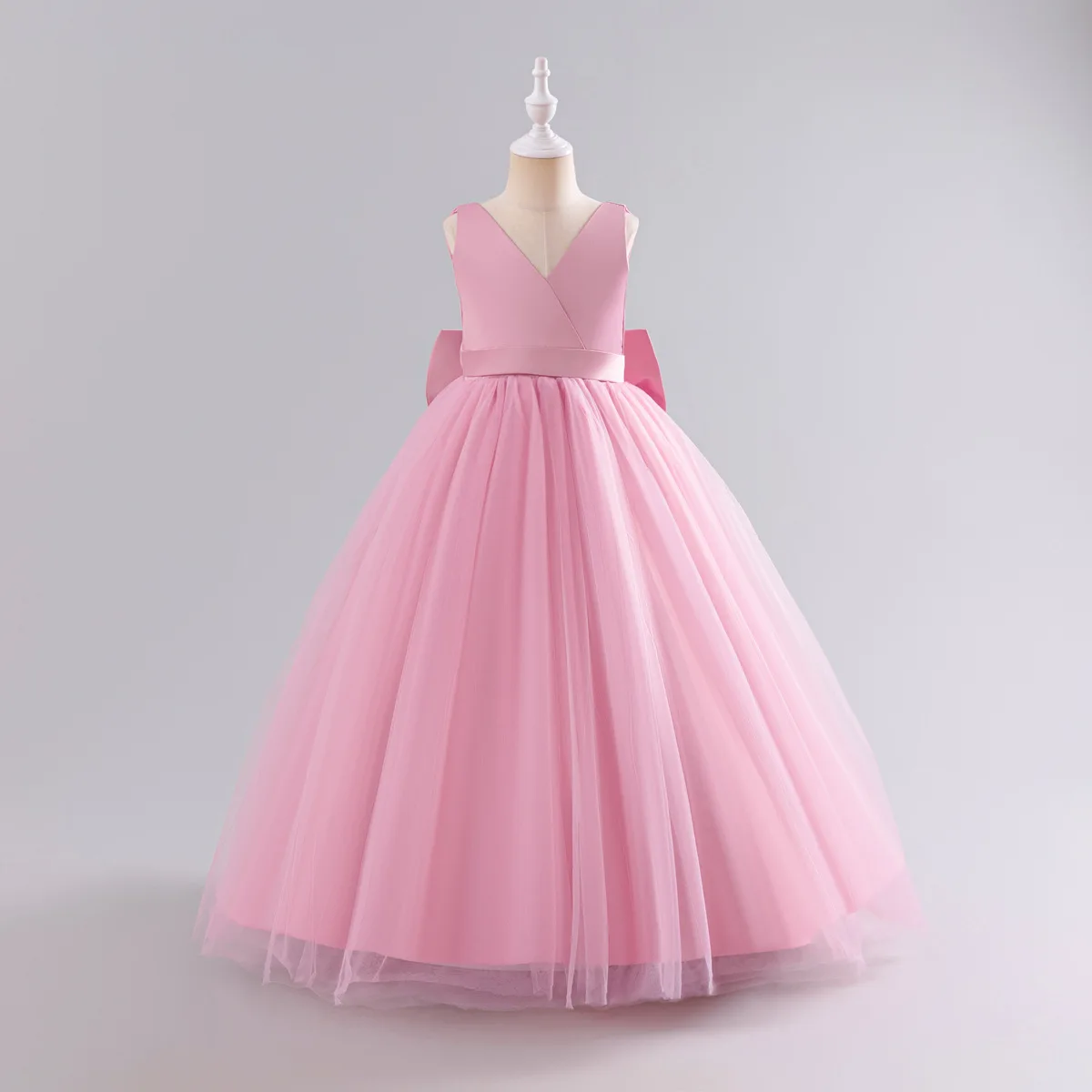 

Kid Sleeveless V-Neck Ball Gown Satin Lining Open-Back Adorned Oversized Ruffled Tiered Tulle Girl Skirt Formal Children Dress