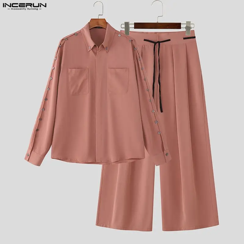 

INCERUN Мужские комплекты Однотонные свободные рубашки с длинными рукавами и брюки с лацканами Комплекты из двух предметов Уличная мода Повседневные мужские костюмы S-5XL