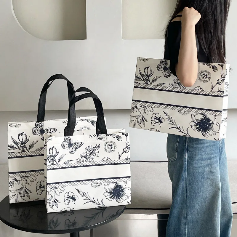 프리미엄 맞춤형 로고 부직포 토트백 - 가정, 비즈니스 및 의류 매장용 재사용 가능한 친환경 쇼핑 선물 가방(1/10개)