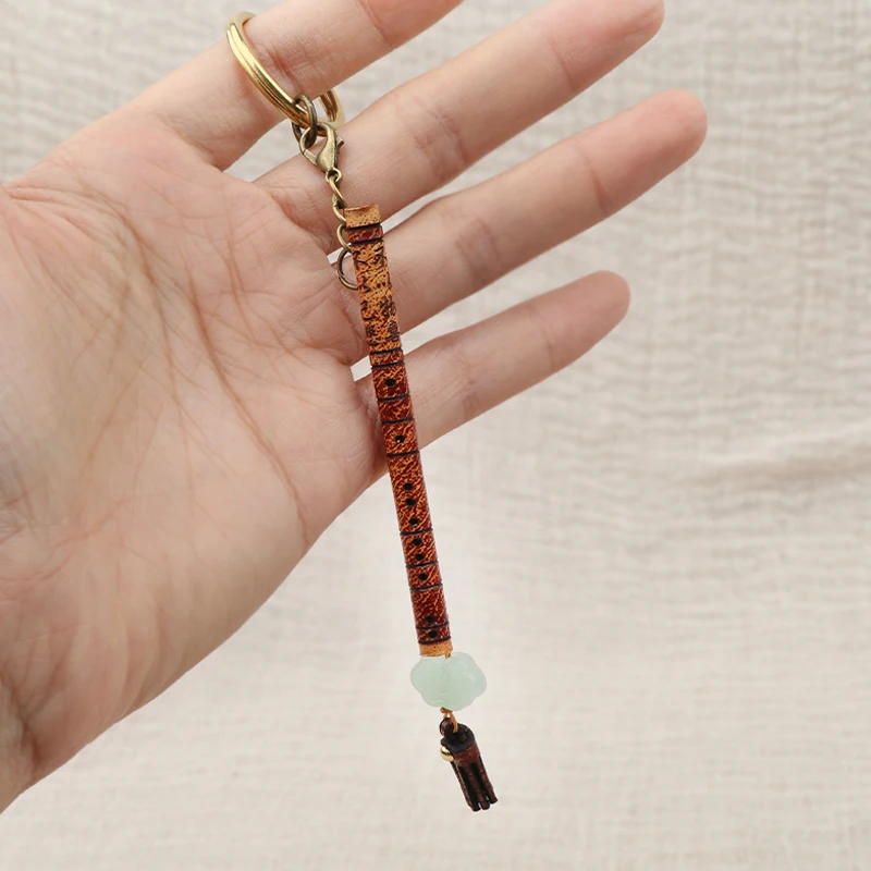 

Handmade bamboo flute keychain pendant genuine leather traditional instrument bag pendant vintage exquisite small pendant