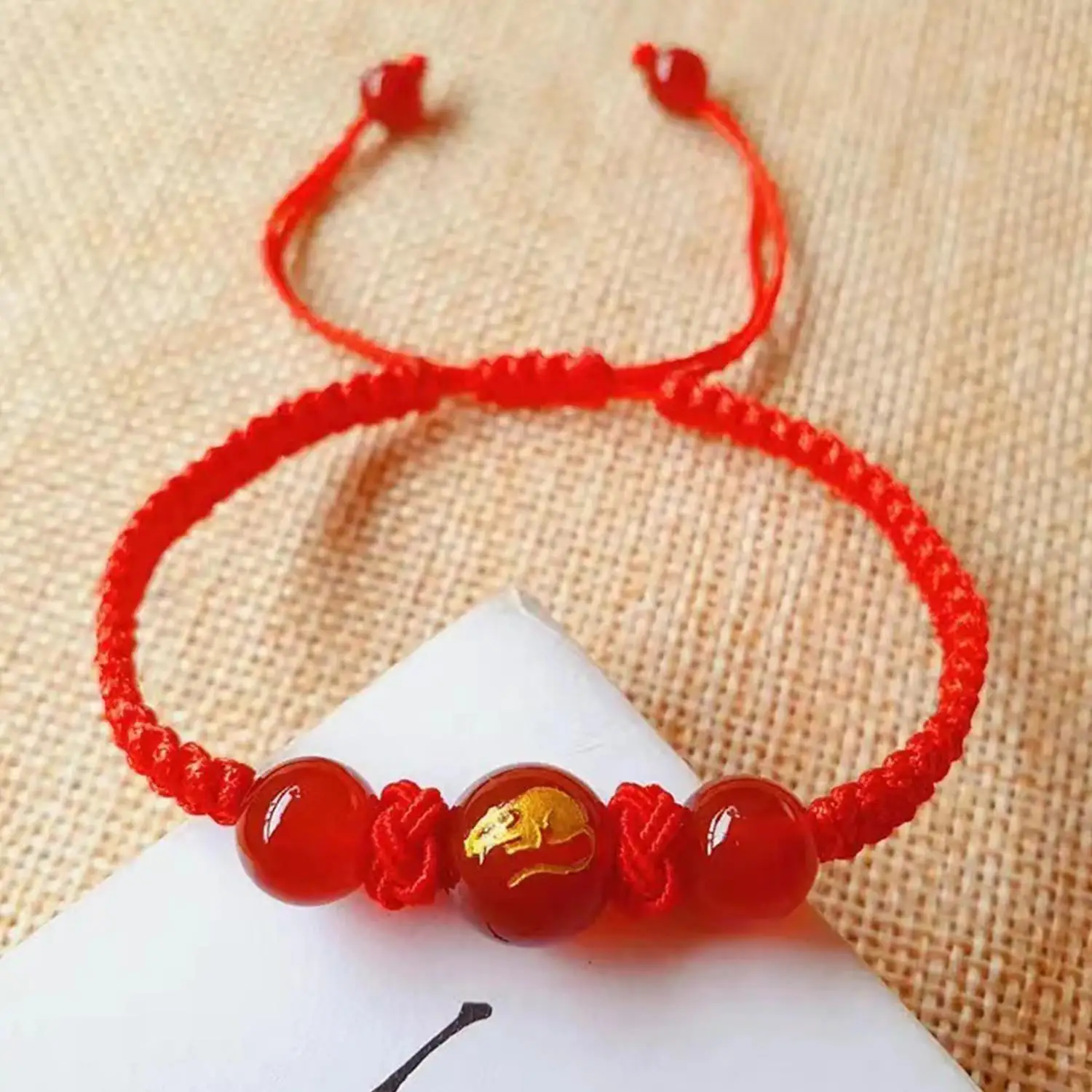 赤いロープビーズの中国の干支ブレスレット,スネークイヤーブレスレット,編みこみのハンドチェーン,ファッションジュエリー,新年の贈り物,2022