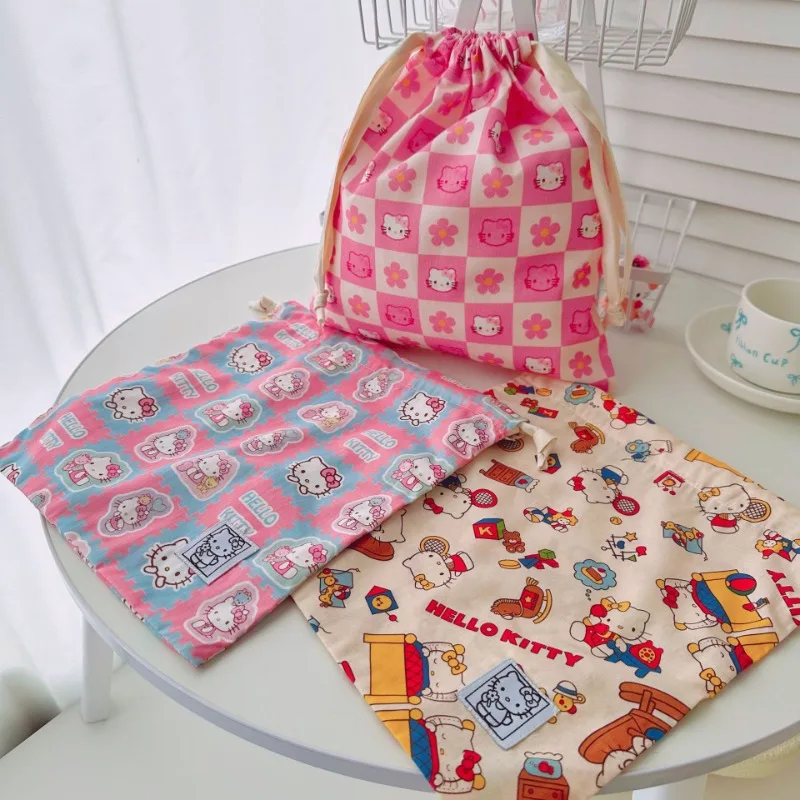 Hello Kitty tissu mode Art Bundle sac de rangement cosmétiques stockage à la main sac décoratif cordon voyage Portable en gros
