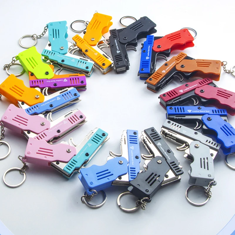 Alloy Plastic Keychain, Folding Rubber Band Gun with 6 Consecutive Firing Children\'s Shooting Toy, Soft Bullet Mini Pistol