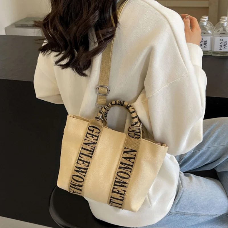 Fashionable Canvas Tote Bag with Adjustable Strap and Magnetic Closure - Perfect for Everyday Use