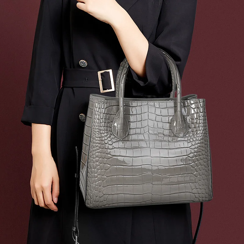 

Aidrani Grey Leather Tote: Gold - Accented Handle, Sophisticated Style