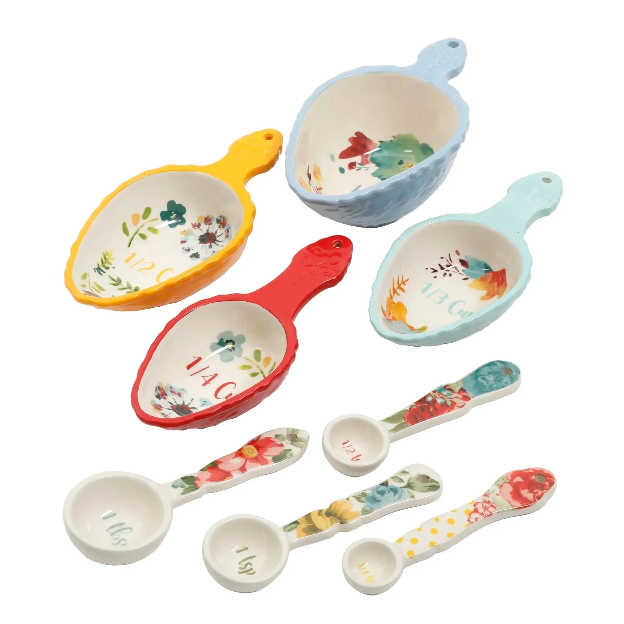 

This set of 8 measuring spoons is made of durable ceramic with a delicate ruffled edge. Dishwasher safe. dish set
