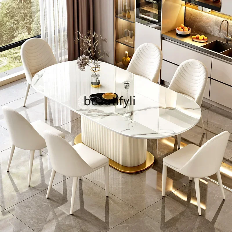 

Cream wind rock slab dining table combination living room oval rock slab Italian light luxury dining table C56