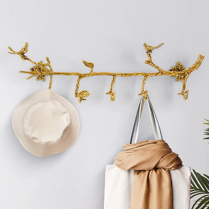 Brass row hook hanger at home, wall hanging in the entrance, light luxury wardrobe, branch-type clothes and hats hook