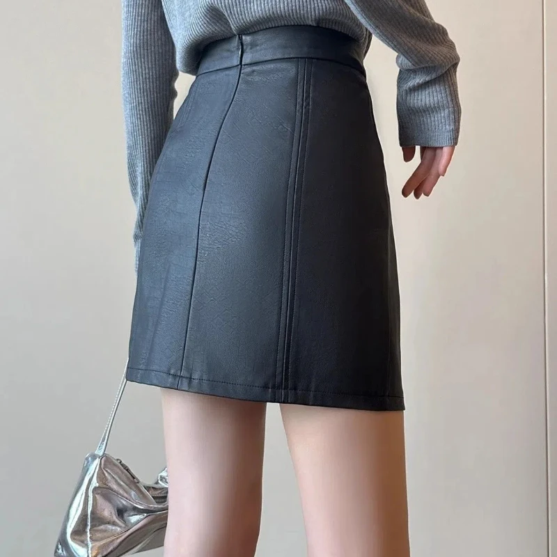 البساطة مكتب سيدة الخريف الشتاء المرأة الصلبة سستة الكورية موضة عالية الخصر قصيرة ضئيلة ألف خط بولي Leather الجلود الورك تنّورة ملفوفة