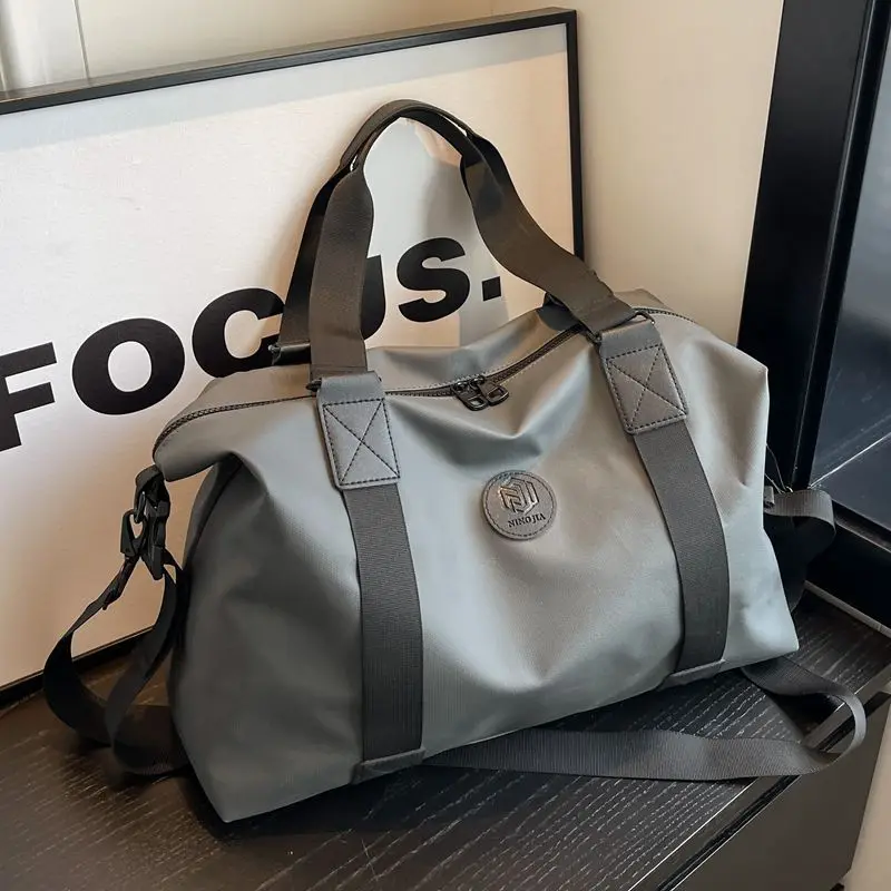 Bolso de viaje de gran capacidad para hombre y mujer, bolsa de hombro deportiva de color negro, sencillo, a la moda, nuevo diseño, 2023