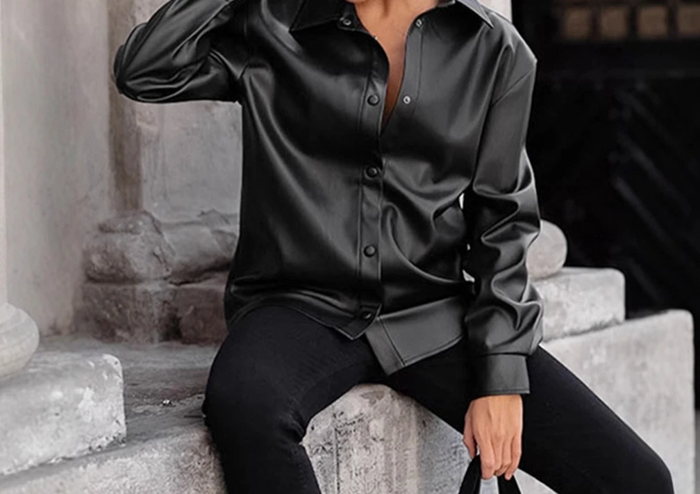 سترة ريترو سوداء من جلد البولي يوريثان للنساء 2025 سترة جلدية أوروبية وأمريكية جديدة ملابس نسائية متوسطة الطول #1