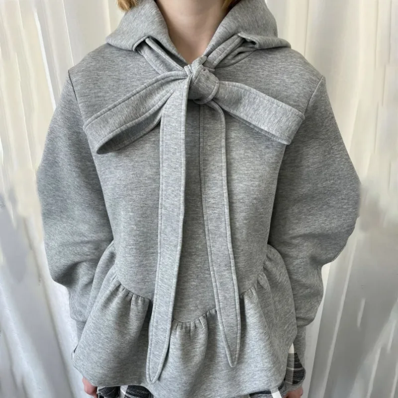 Pull à capuche à lacets avec nœud pour femme, polyvalent, manches longues, bord à volants, épissage, nouvelle collection printemps