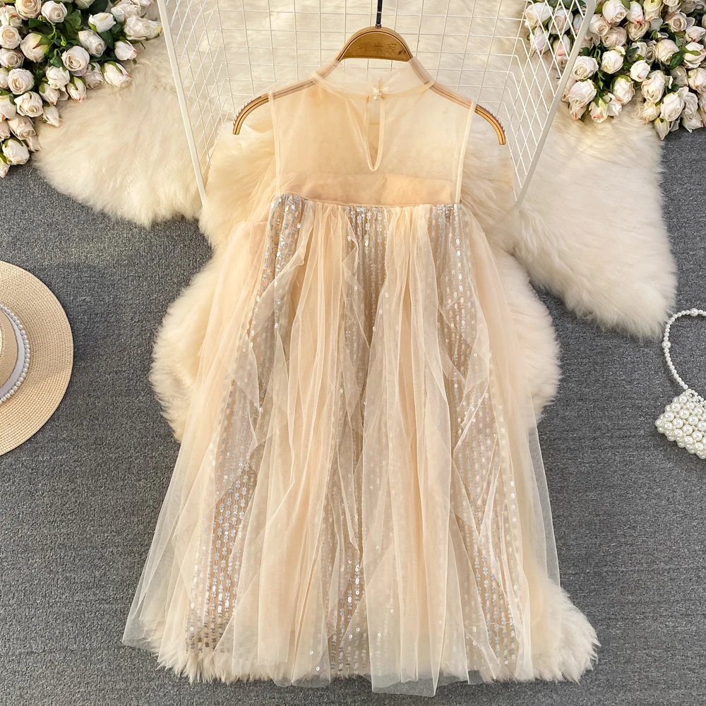 أنيقة الفرنسية فضفاضة الجولة الرقبة بلا أكمام الحلو لطيف فستان جنية 2025 صيف جديد مطرزة ألف خط الشاش فساتين المشمش الكورية