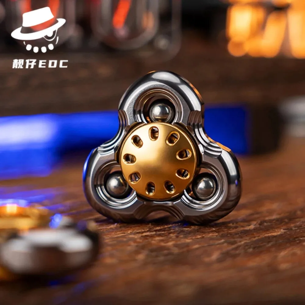 وسيم الرجل EDC جي ليان تململ سبينر الألومنيوم الفولاذ المقاوم للصدأ الدوران ثلاثة شفرات دفع الشعور تململ سبينر مكتب الملحقات