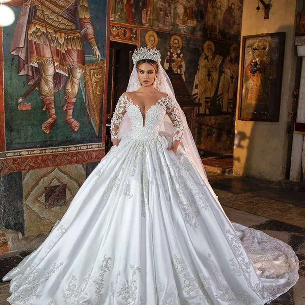 

Великолепное бальное платье Свадебные платья с v-образным вырезом и кружевными аппликациями с длинными рукавами и кристаллами Свадебные платья больших размеров Robe De Mariee по индивидуальному заказу