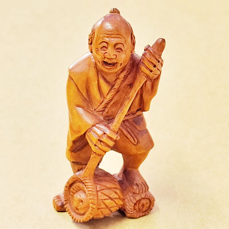 

Y8889 - 20 Years Old 2" Hand Carved Boxwood Netsuke : Fisherman with net on pole