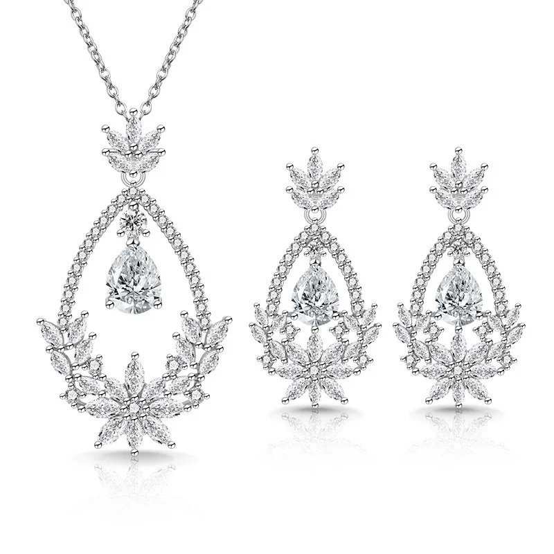 925 Silver Set. Red Pear Zircon, Delicate Leaf Details. Elegant Pendant and Earrings. Sophisticated Women's Jewelry.