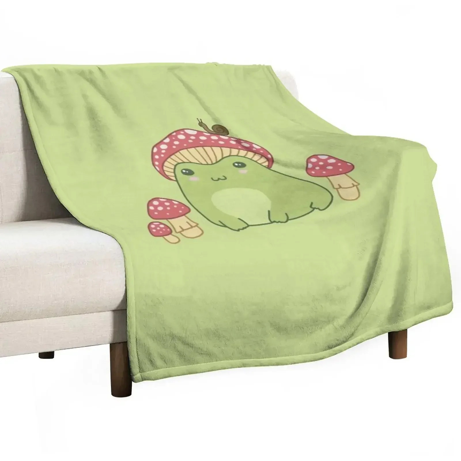 

Kawaii Frog with Mushroom Hat: Cottagecore Aesthetic, Toadstool and Snail Companion, Perfect for Frogge Lovers Throw Blanket