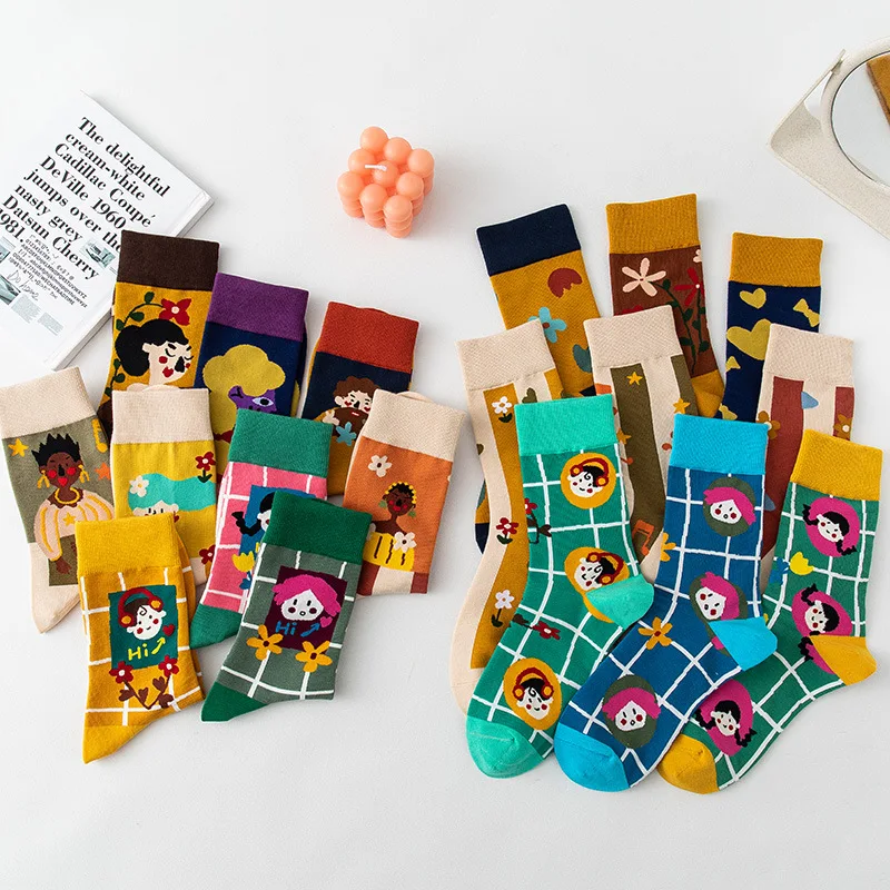 A pair of male and female asymmetrical AB new fashion Harajuku high quality high tube socks creative cartoon cotton socks