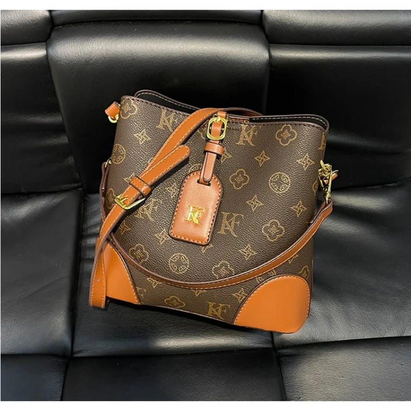 Toplaagse dameshandtassen, gemaakt van echthoekig bedrukt leer, trendy Wales, duurzame, lichtgewicht, zachte stijl