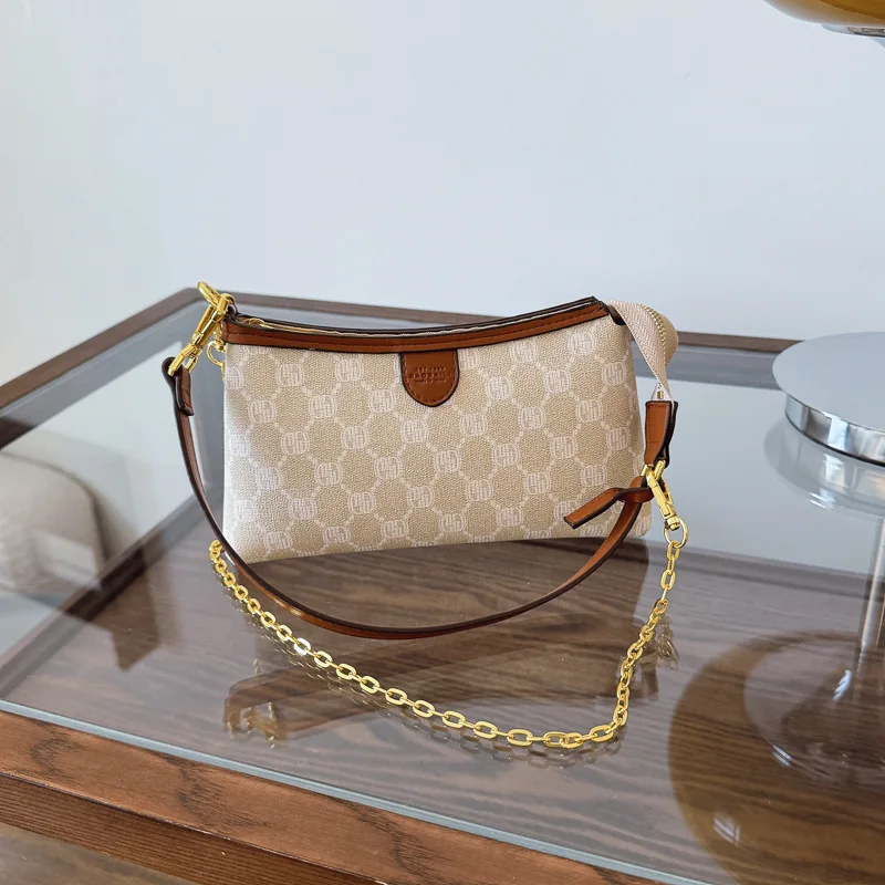 

2025 Новая женская стильная винтажная универсальная сумка с принтом - нишевый дизайн в стиле плеч, модная для повседневной повседневной одежды