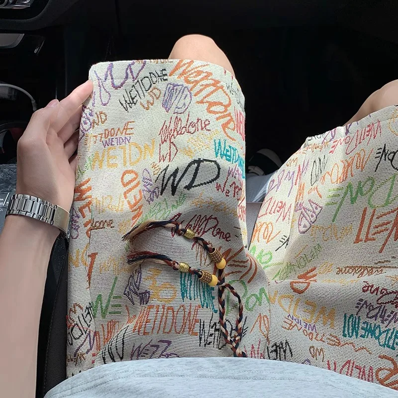 Letter graffiti knitted shorts men's summer thin fashion brand full print pants beach vacation five quarter pants