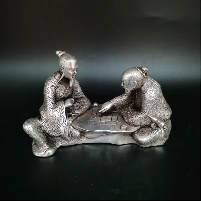 Antique bronze chess set, featuring a white bronze figure of an old man, a bronze chess piece, and a silver-plated bronze chess