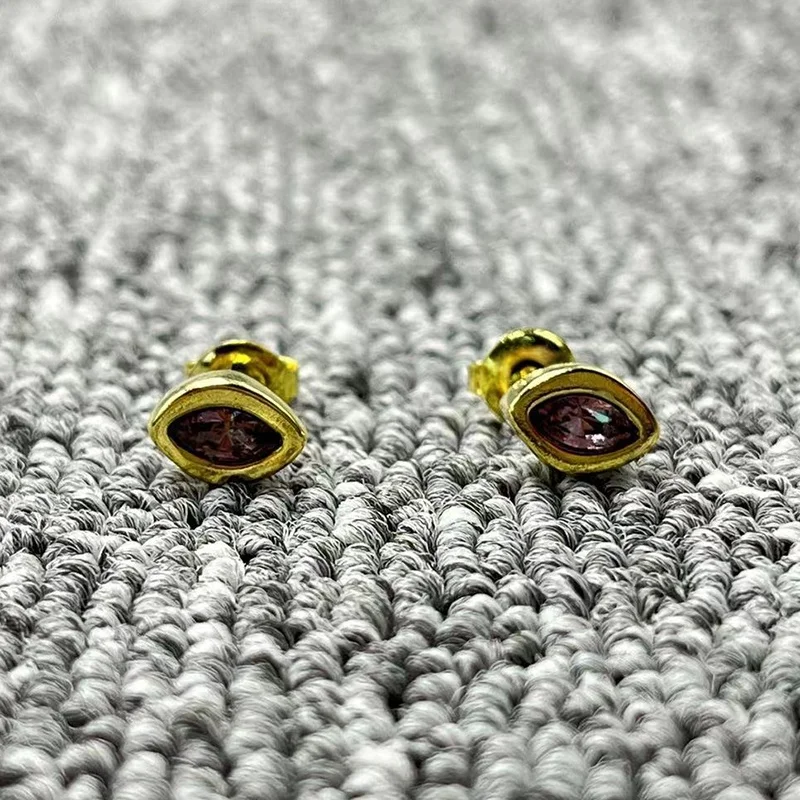 Gilded horse eye purple gemstone earrings, niche and high-end commuting accessories