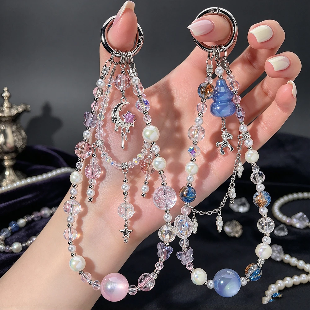 Luxurious cat-eye crystal mobile phone pendant. Fluid star and moon small horse charm pendant bag chain. Cute birthday gift.