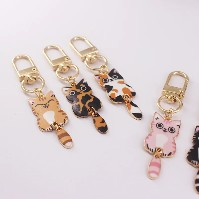 Cute printed cat cartoon mini alloy keychain pendant bag zipper pendant couple exquisite accessories