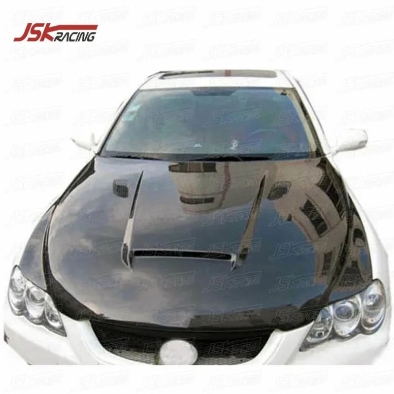 

Капот из карбона в стиле M3 для Reiz 2005-2009 годов